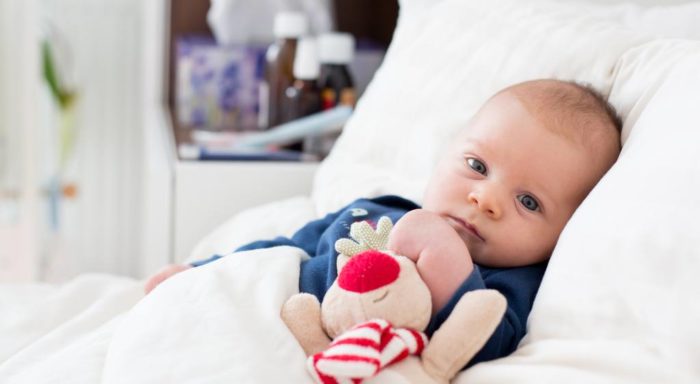 children treatment featured image baby in bed